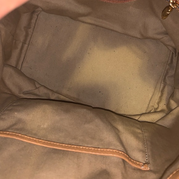 The heritage bucket bag, crafted in monogram coated canvas with French leather. - Picture 3 of 5